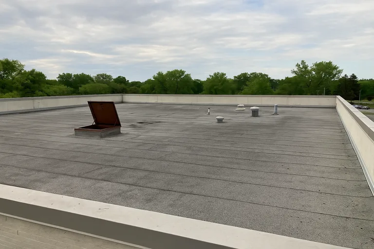 Granulated modified bitumen roof on a single-story commercial building in Fort Bend County