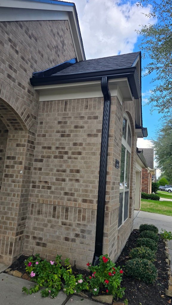 Gutters by CS Roofing Concepts &mdash; Seamless aluminum, matte black